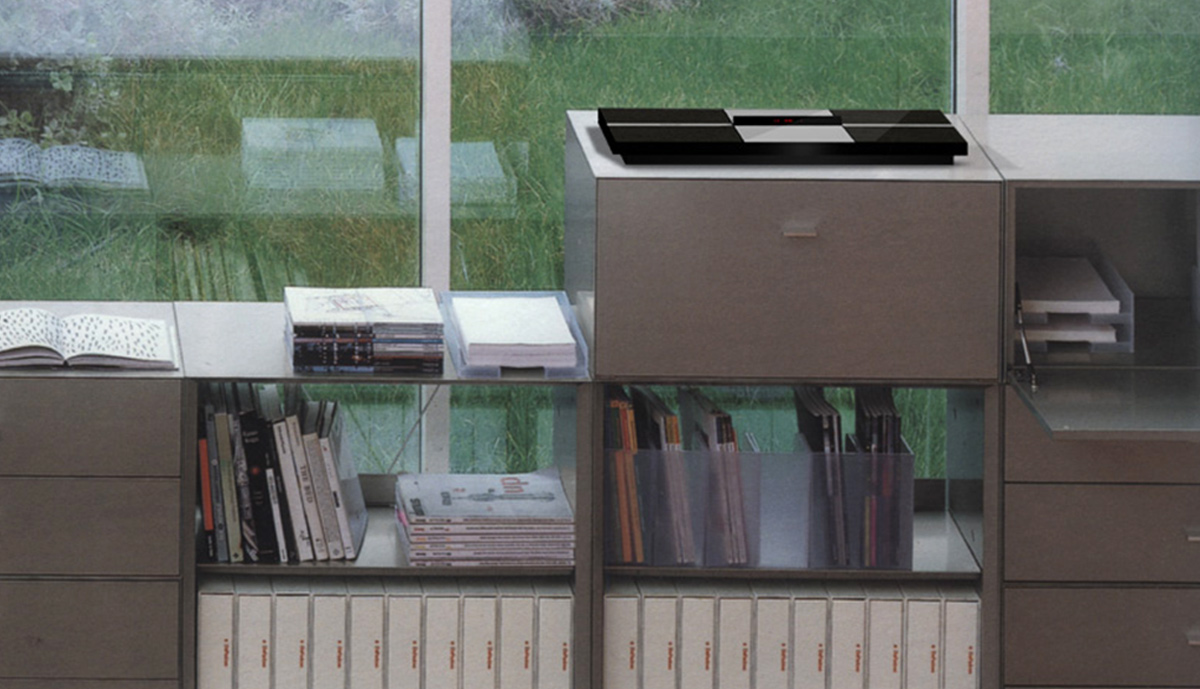 Beosound Millenium music player on a shelving unit