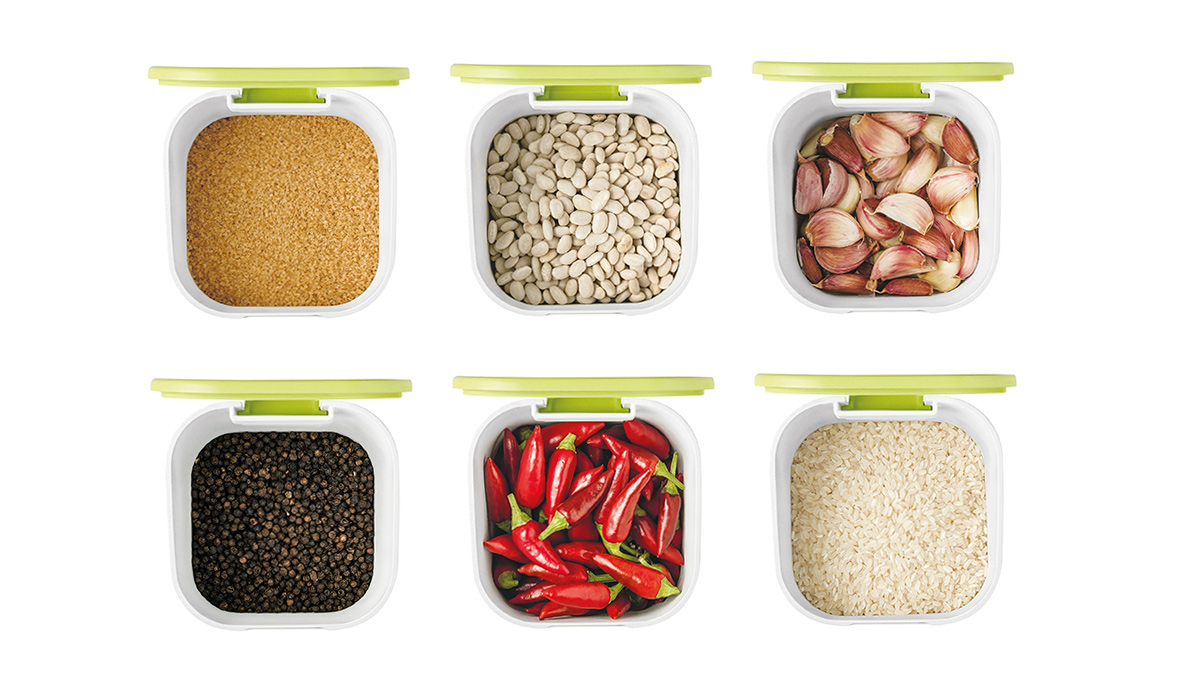 Six Guzzini storage containers filled with food