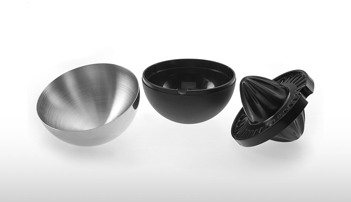 Stelton Rise &rsquo;n&rsquo; Shine juicer components: steel bowl, black base and double reamer